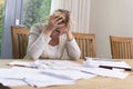 Woman in financial stress Royalty Free Stock Photo