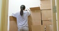 Woman find the clothes in cardboard box