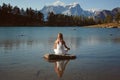 Woman finds peace in mountain lake Royalty Free Stock Photo