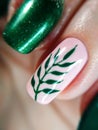 Woman finger pink nude nature green branch leaf manicure gel nail polish swatch design art beauty fashion macro photo Royalty Free Stock Photo