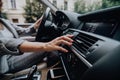 Woman finger pressing emergency button on car dashboard Royalty Free Stock Photo