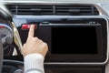 Woman finger pressing emergency button on car dashboard. Royalty Free Stock Photo