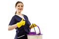 Woman finished cleaning showing a happy thumbs up after a successful spring cleaning.