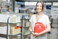 Woman with first aid kit in the pharmacy Royalty Free Stock Photo