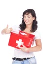 Woman with first aid kit and thumbs up Royalty Free Stock Photo