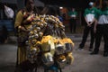 Woman and first aid team caring for pierced Hindu devotee at Thaipusam festival in Penang, Malaysia