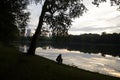 Woman is fishing at Bolshoy Golovinsky pond in Mikhalkovo park of Moscow, Russia. Royalty Free Stock Photo