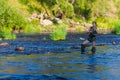 Woman fishing portrait Royalty Free Stock Photo