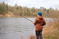 Woman with fishing rod Royalty Free Stock Photo