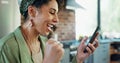 Woman, fist and celebration with phone in home kitchen with competition for prize, giveaway or reward. Person