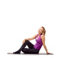 Woman, fitness and happy portrait on floor in studio for yoga, performance and healthy body isolated on white background Royalty Free Stock Photo