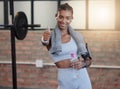 Woman, fitness and portrait smile with thumbs up for good job, workout success or thank you with water bottle at gym Royalty Free Stock Photo