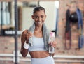 Woman, fitness and portrait smile with water bottle and sweat towel for exercise, workout or training at gym. Happy Royalty Free Stock Photo