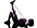 Woman fitness resistance bands silhouette Royalty Free Stock Photo