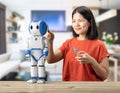 Woman fix robot assistant
