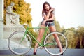 Woman with fixie bicycle Royalty Free Stock Photo