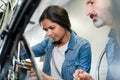 woman fixing gear on bicycle Royalty Free Stock Photo