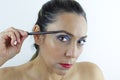 Woman fixing her eye brows Royalty Free Stock Photo