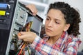 Woman fixing pc at home Royalty Free Stock Photo