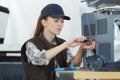 woman fixing printer at office Royalty Free Stock Photo