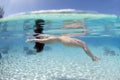 Woman float adrift at Moorea island in Tahiti French Polynesia