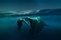 Woman floating under water Royalty Free Stock Photo