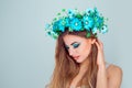Woman floral crown with floral crown on head in side profile