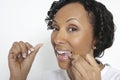 Woman Flossing Teeth Royalty Free Stock Photo