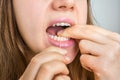 Woman flossing teeth with dental floss Royalty Free Stock Photo