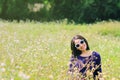 Woman in flower field. Royalty Free Stock Photo