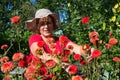 Woman in flower garden Royalty Free Stock Photo