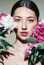 woman flower portrait beauty model pink healthy face girl make-up blush Royalty Free Stock Photo