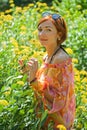 Woman among the flowers