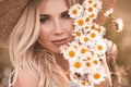 Woman with flowers outdoors Royalty Free Stock Photo