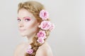 Woman with with flowers and roses in hair Royalty Free Stock Photo