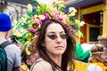 Woman in Flowery Headdress Celebrating Mardi Gras Day in the Marigny