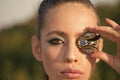 Woman with fly brooch jewelry at makeup face, look. Fashion look of stylish girl, makeup trend. Cosmetics for visage and