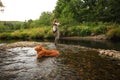 Woman Fly Fishing Small Stream For Trout Royalty Free Stock Photo