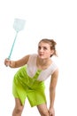 Woman with fly swatter Royalty Free Stock Photo