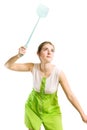 Woman with fly swatter Royalty Free Stock Photo
