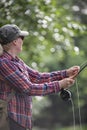 Woman flyfishing Royalty Free Stock Photo
