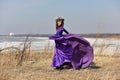 Woman flying lilac dress