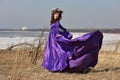 Woman flying lilac dress