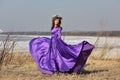 Woman flying lilac dress