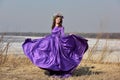 Woman flying lilac dress