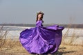 Woman flying lilac dress