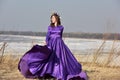 Woman flying lilac dress