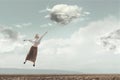 Woman flying in the sky carried by a cloud