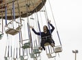 Woman on flying swings Royalty Free Stock Photo