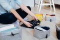 Woman folding clothes on the floor, organizing stuff and laundry Royalty Free Stock Photo